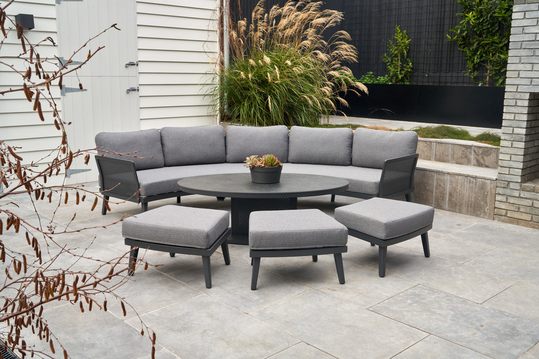Boston round outdoor sofa setting with pop-up coffee table