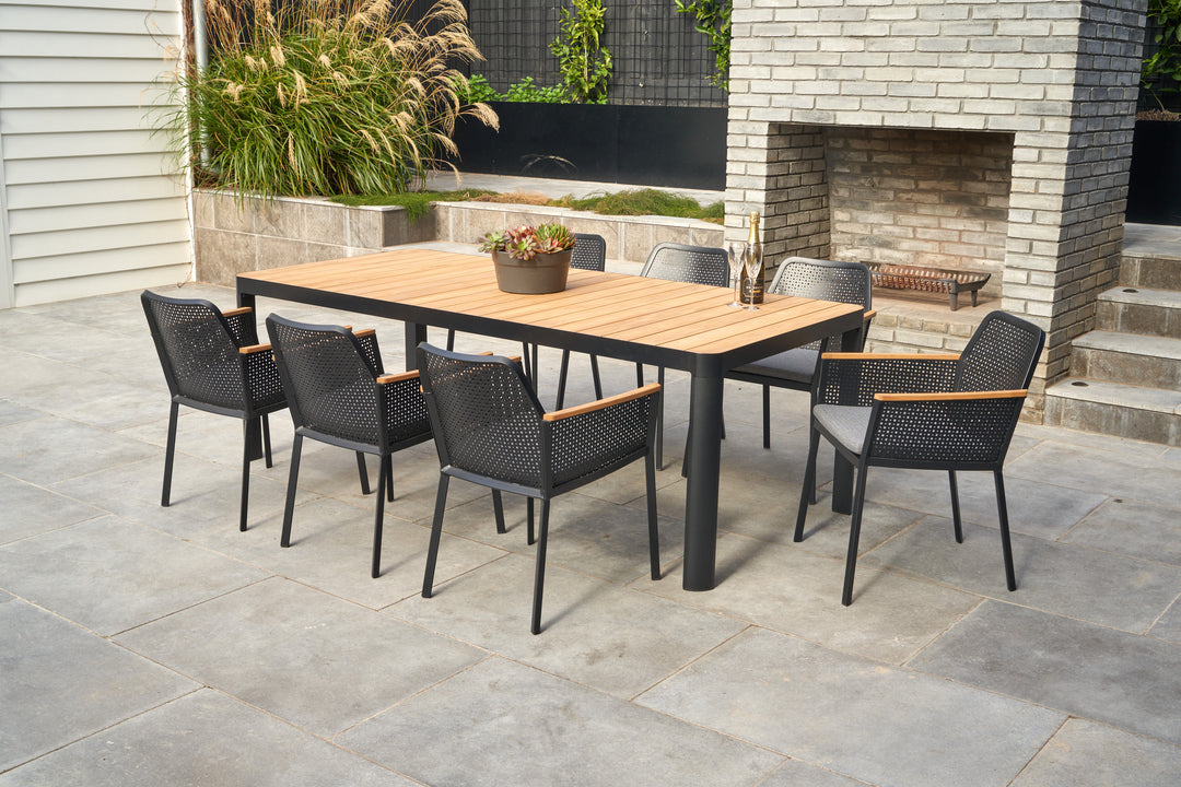 Bonn teak table and 8 Apex chairs in black